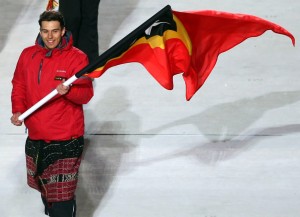 SOCHI, RUSSIA - FEBRUARY 07: Skier Yohan Goncalves Goutt of the Timor-Leste Olympic team carries his country's flag during the Opening Ceremony of the Sochi 2014 Winter Olympics at Fisht Olympic Stadium on February 7, 2014 in Sochi, Russia. (Photo by Bruce Bennett/Getty Images)